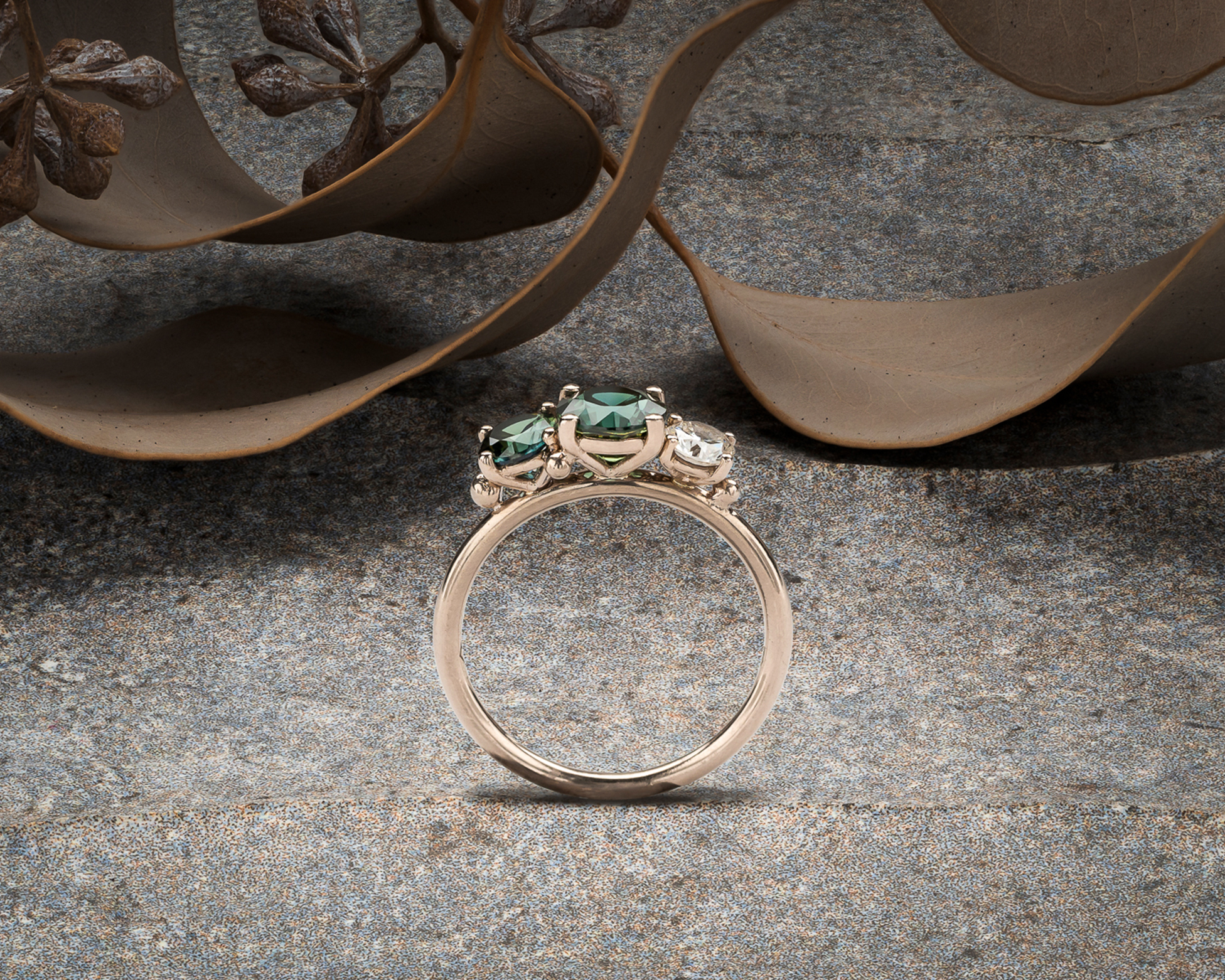 Cluster engagement ring with Australian parti sapphire Argyle diamond