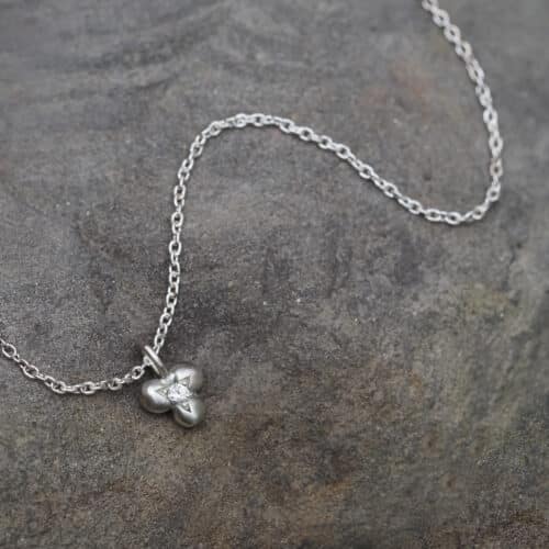 A small sterling silver necklace with a white diamond handmade in Sydney, Australia